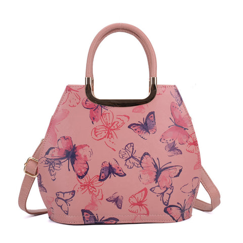 Butterfly handbag with metal accents